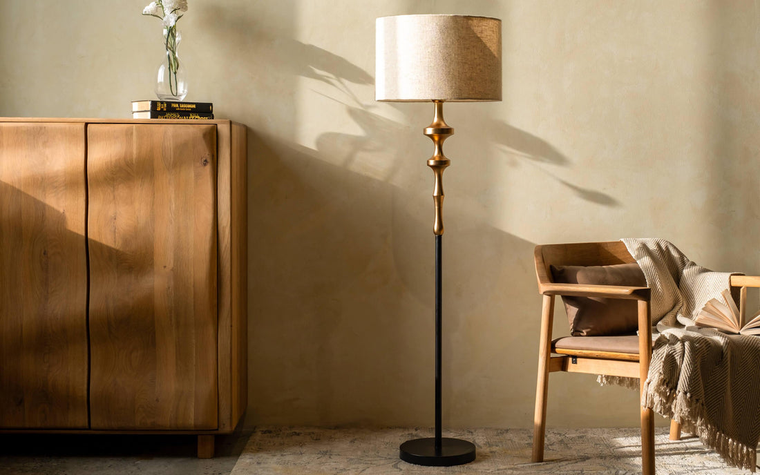 Elegant floor lamp next to an armchair a simple Father's Day gift idea for a reading.