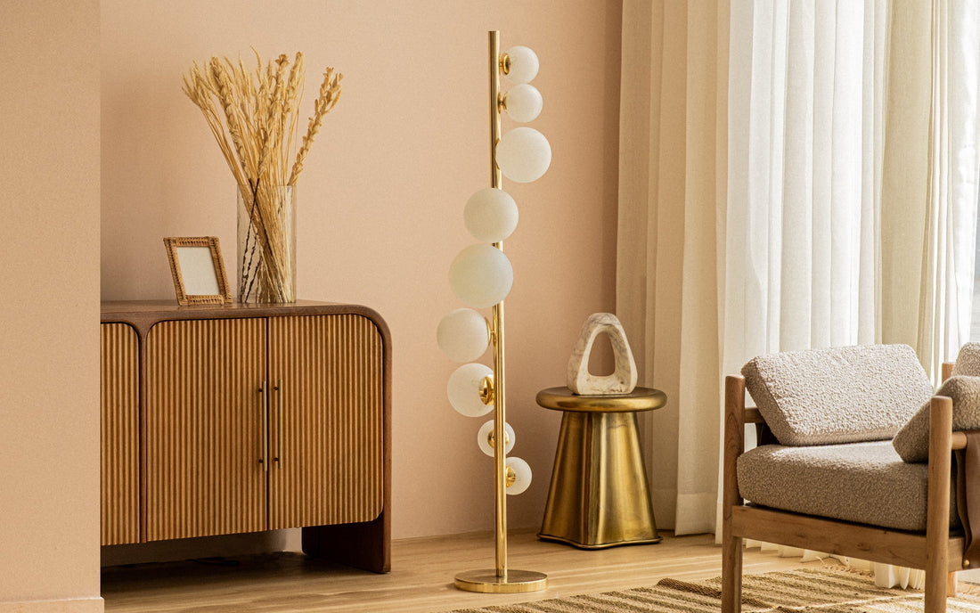 Sculptural floor lamp and wooden sideboard, perfect gift ideas for married couples.