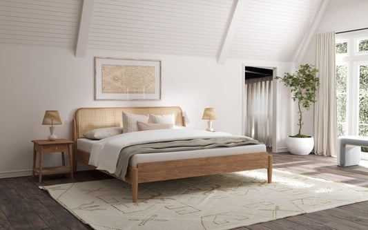 King size wooden bed in spacious bedroom