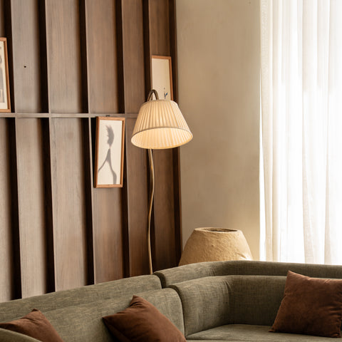Modern floor lamp in brass finish