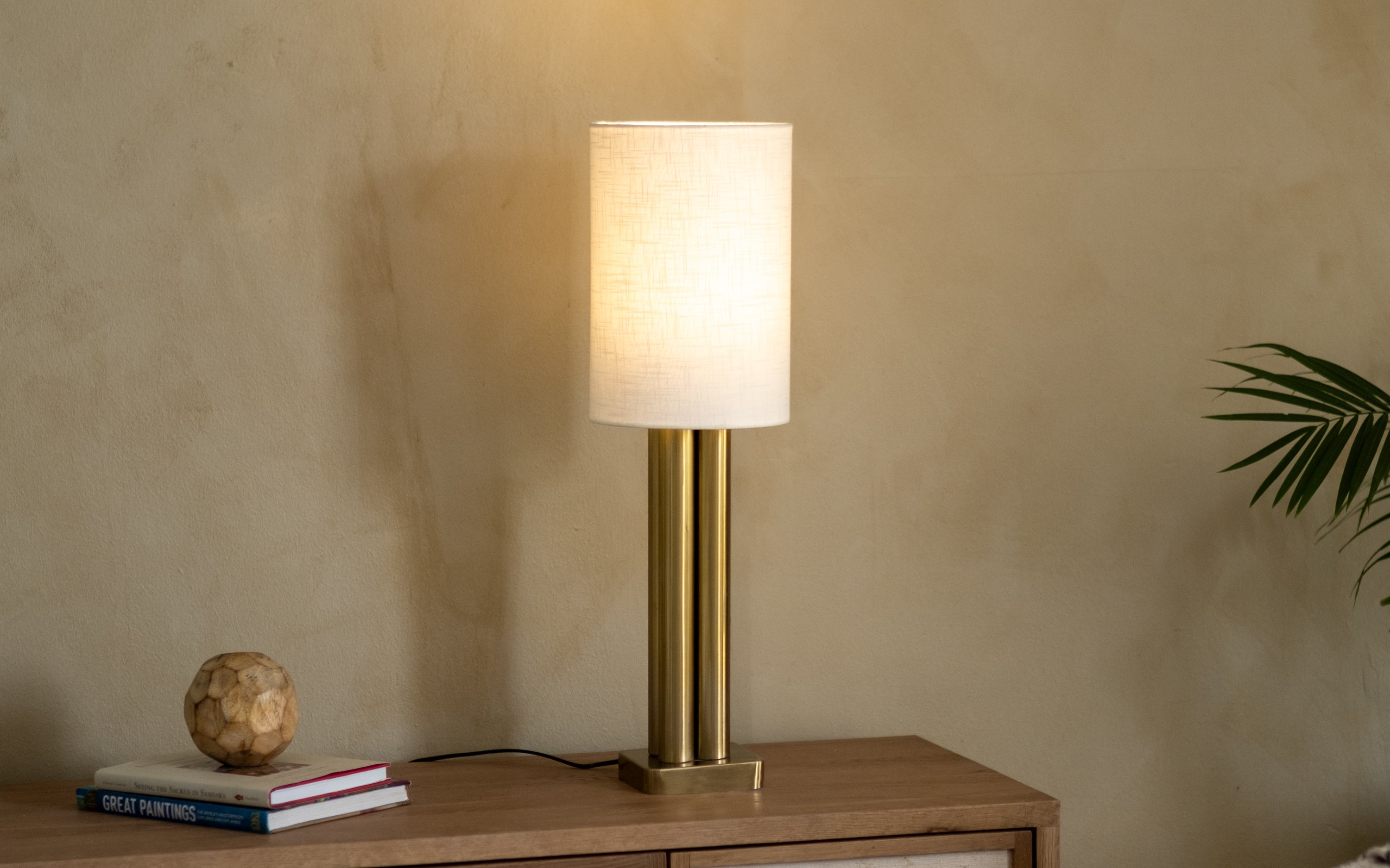 Solis Gold Table Lamp | Gold Finished Base & White Linen Shade - Close shot - Orange Tree