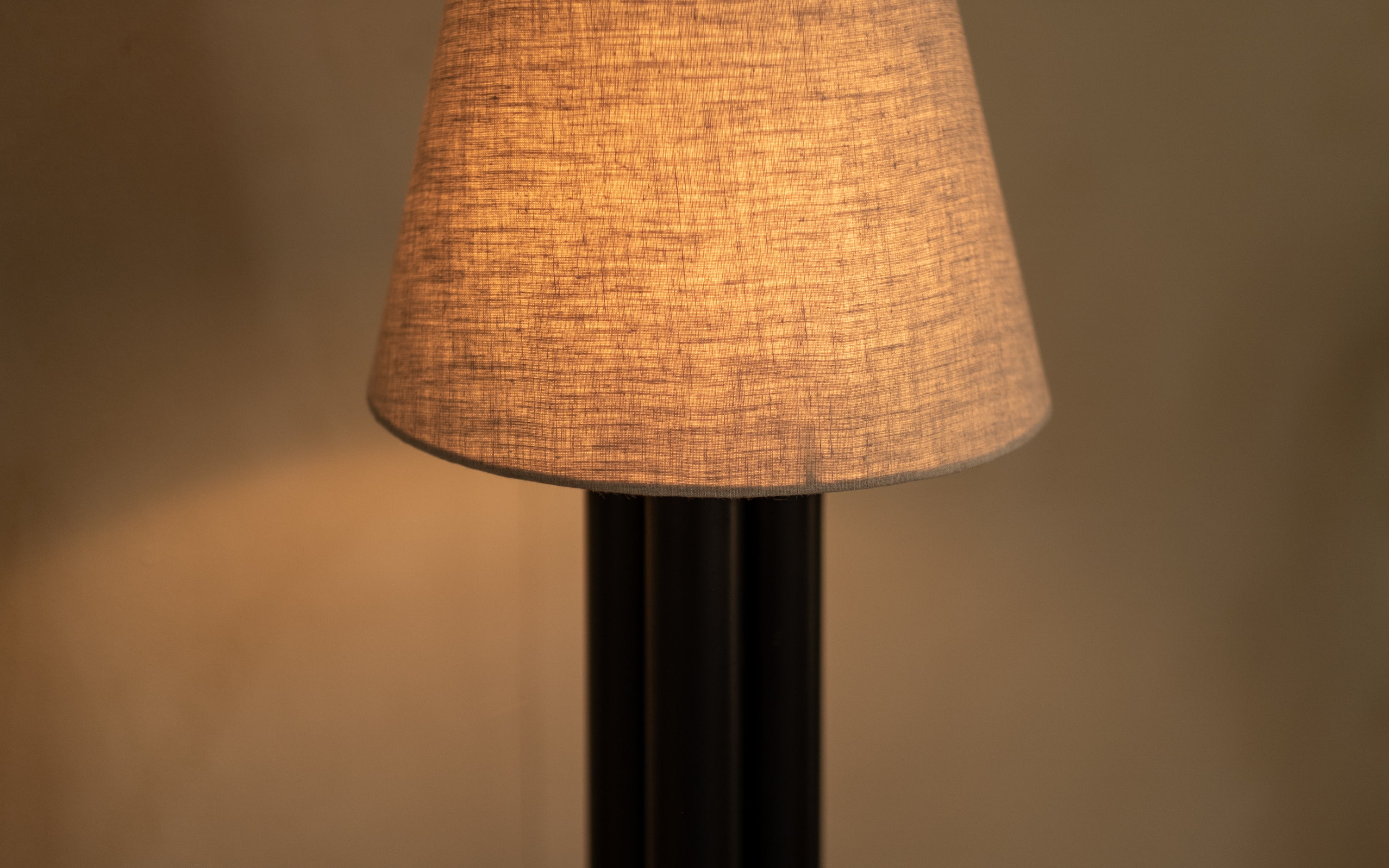Solis Tall Table Lamp | Black Metal Base & White Linen Shade - with white background - Orange Tree