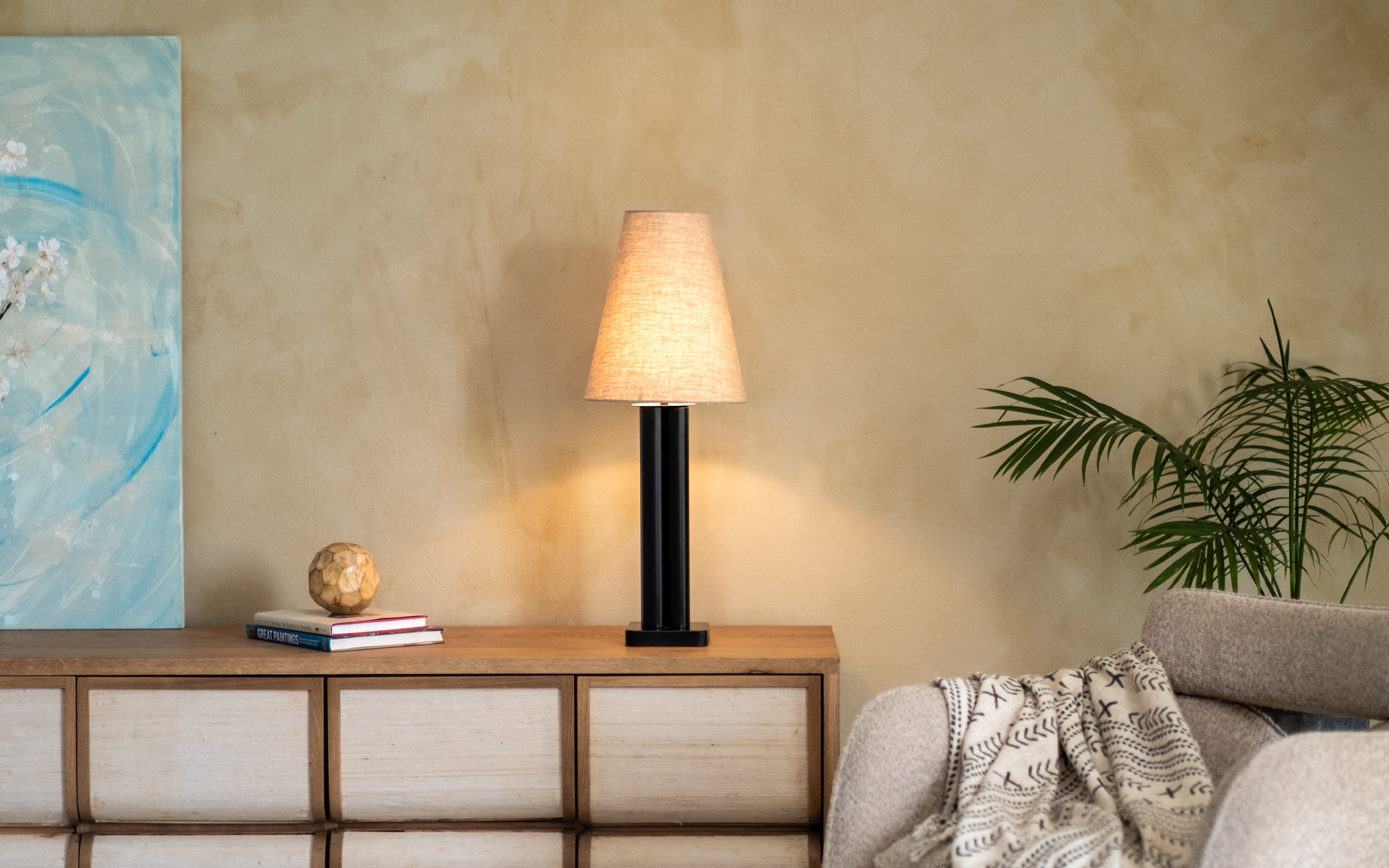Solis Tall Table Lamp | Black Metal Base & White Linen Shade - Close shot - Orange Tree