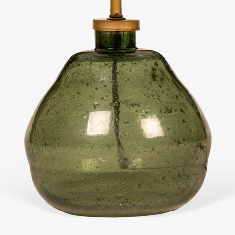 Close-up profile of the rounded green glass lamp base.
