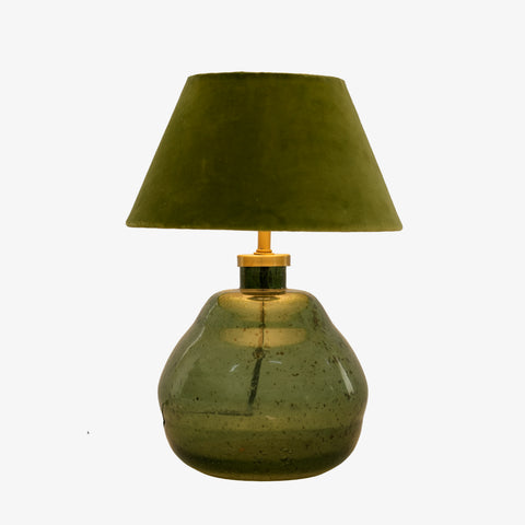 Studio front-view shot of the small green glass lamp and shade.