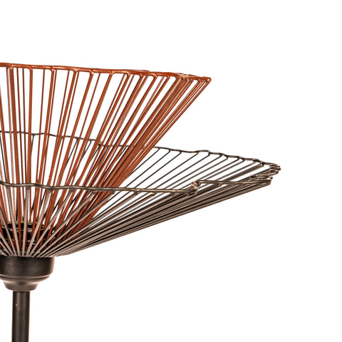 Modern floor lamp with sculptural black and brown metal design.