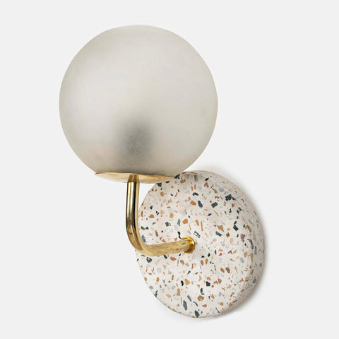Eros White Wall Lamp with Terrazzo base, Gold-finished Mild Steel, and Frosted Glass shade.  This lamp is available online in India.