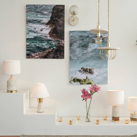 Eros White Wall Lamp with Terrazzo base, Gold-finished Mild Steel, and Frosted Glass shade.  This lamp is available online in India.