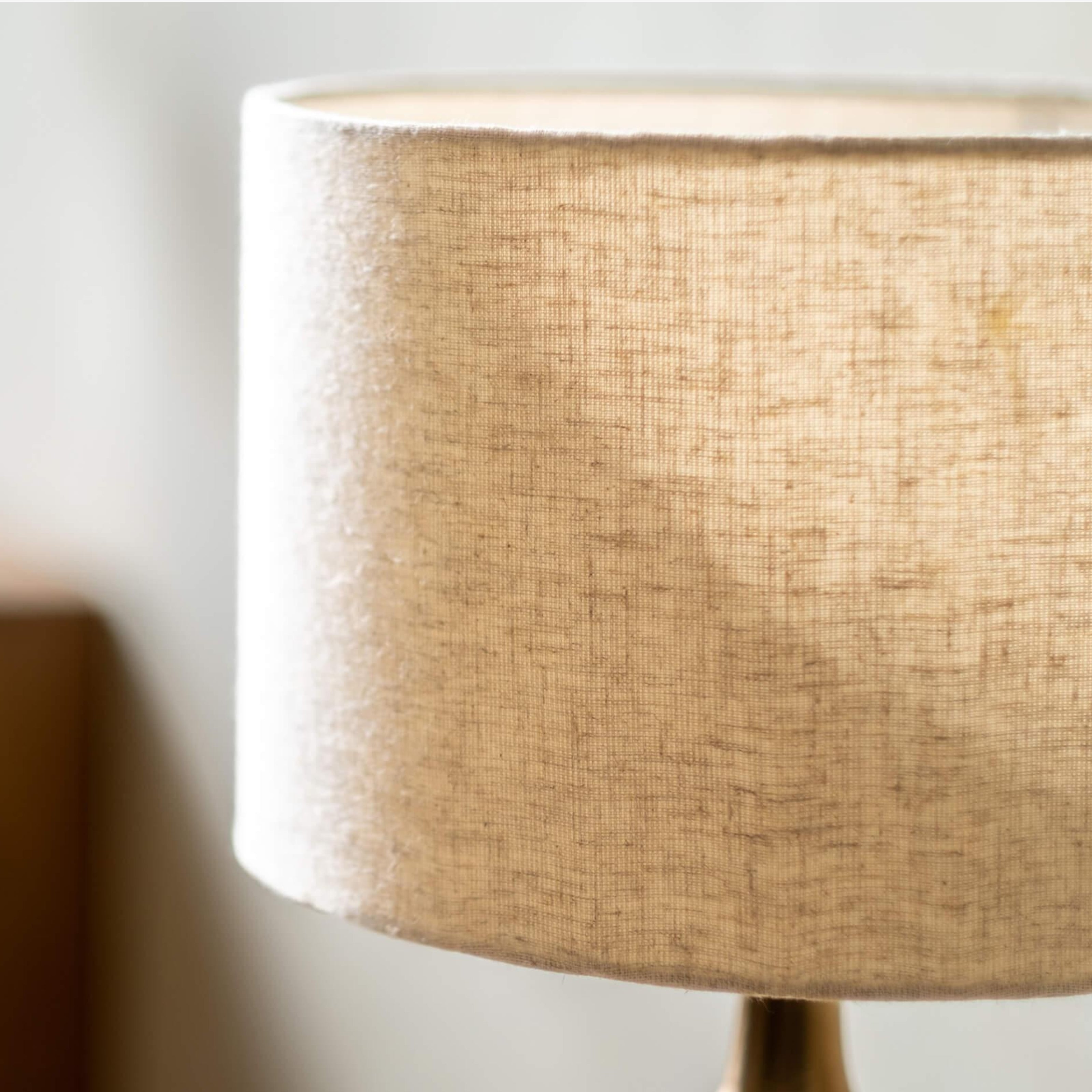 David Floor Lamp with gold plated lamp base, black finish, and natural linen shade. Elegant floor lamp for modern interiors.