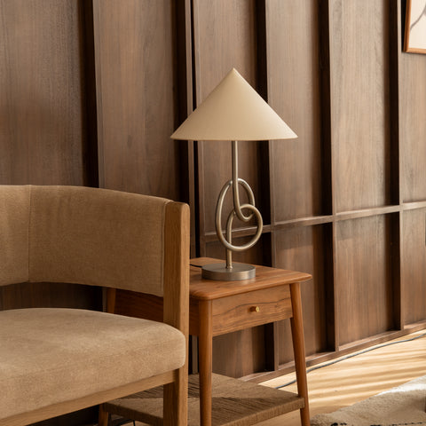 Modern table lamp styled on bedside table in bedroom