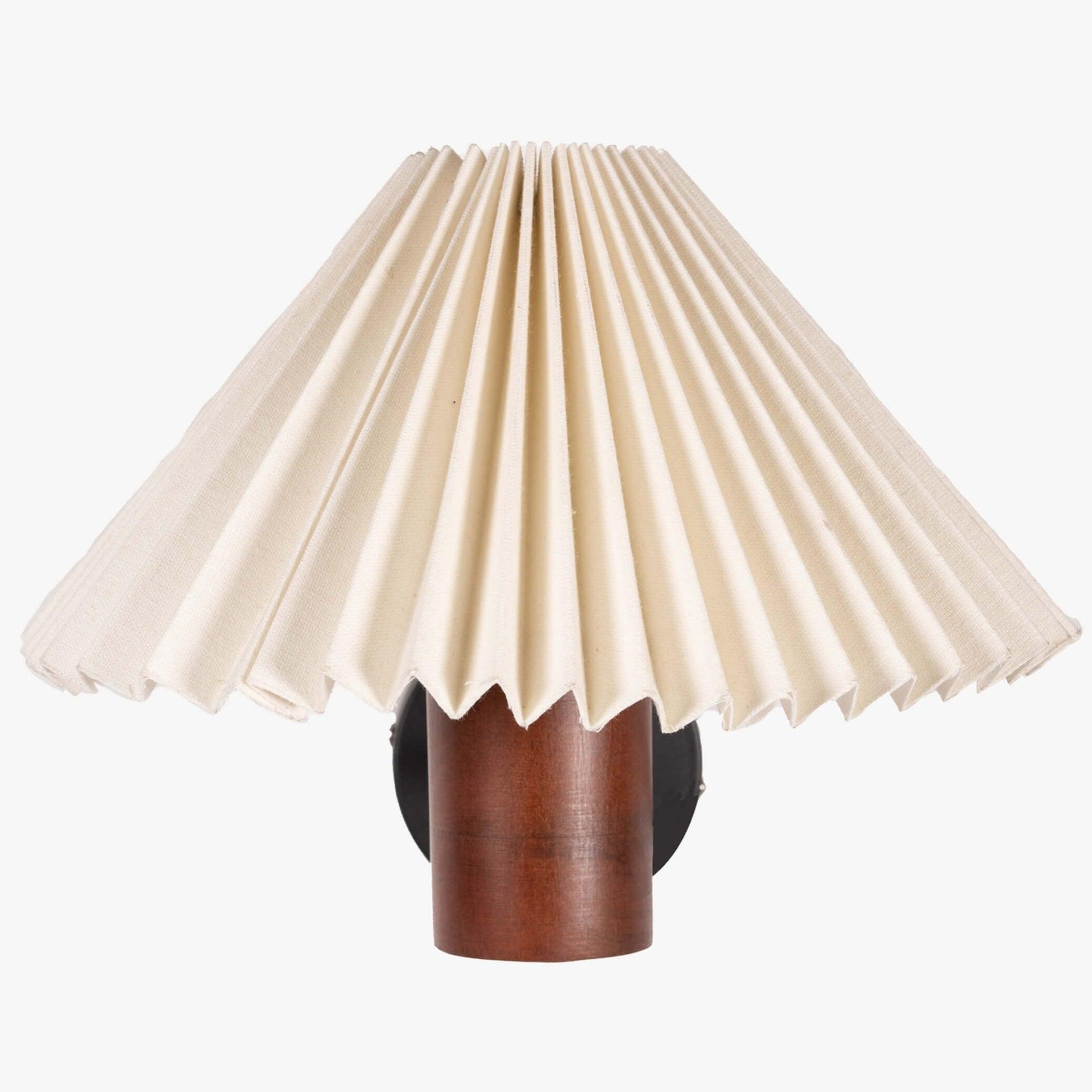 White pleated shade wall lamp with a natural wooden cylindrical base in walnut finish, perfect as a bedside wall lamp or decorative wall sconce for minimalist and vintage interiors.