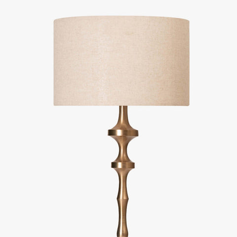 David Floor Lamp with gold plated lamp base, black finish, and natural linen shade. Elegant floor lamp for modern interiors.