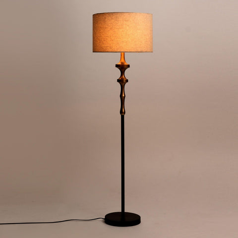 David Floor Lamp with gold plated lamp base, black finish, and natural linen shade. Elegant floor lamp for modern interiors.