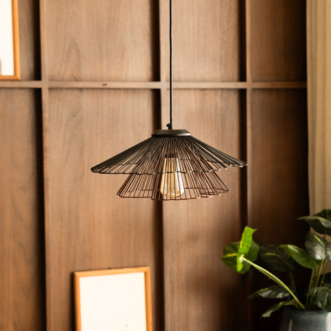 Modern hanging light with sculptural black and brown metal shade.