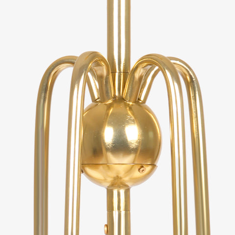 Polished brass chandelier center with curved metal arms.