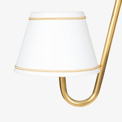 Focused view of the curved gold arms and shade attachment of high-quality floor lamps for living room.