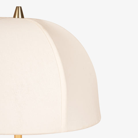 Close-up of curved fabric floor lamp shade showing smooth stitching and soft texture.