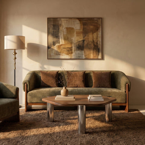 Living room setup with three-seater sofa and wooden coffee table