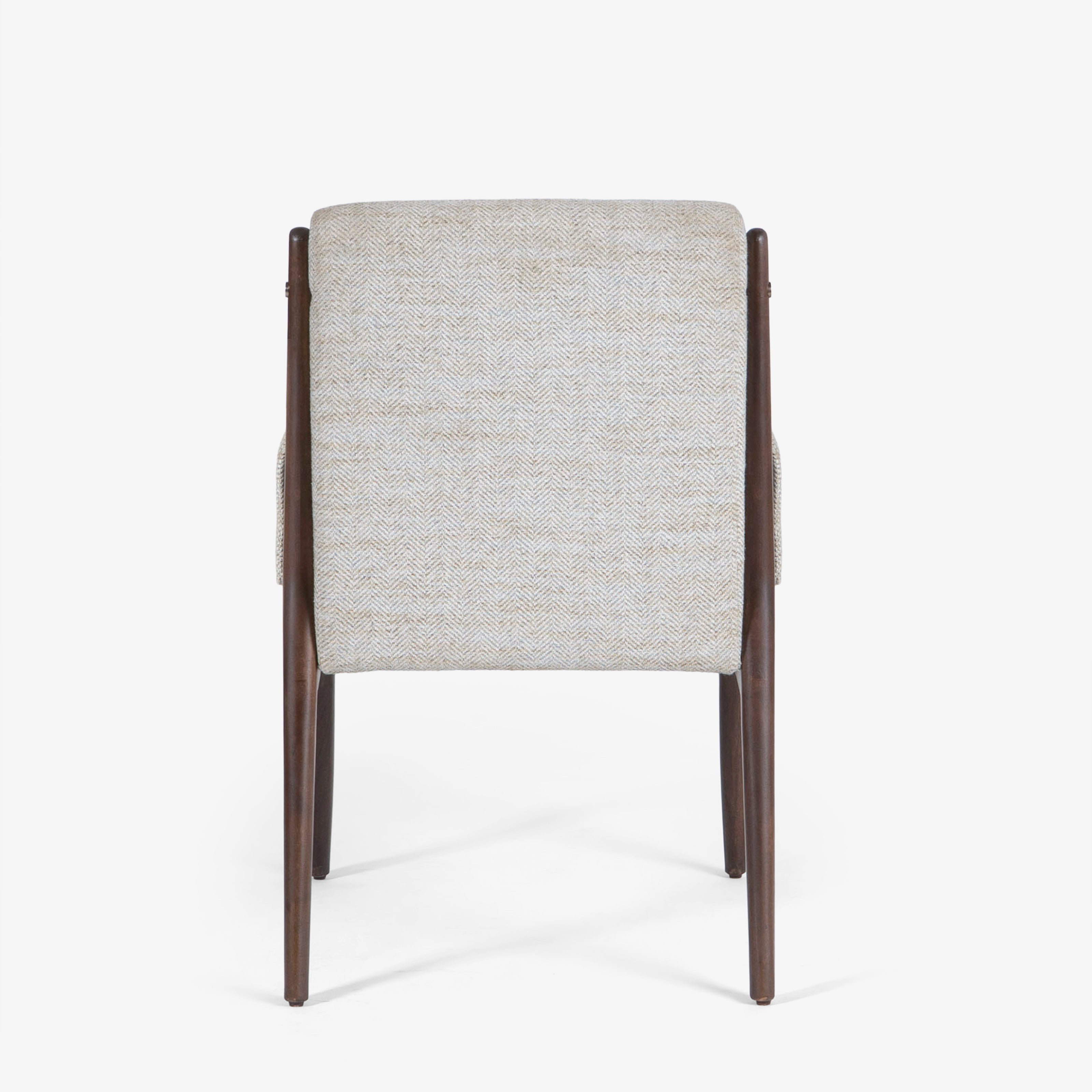 Back view of upholstered armchair