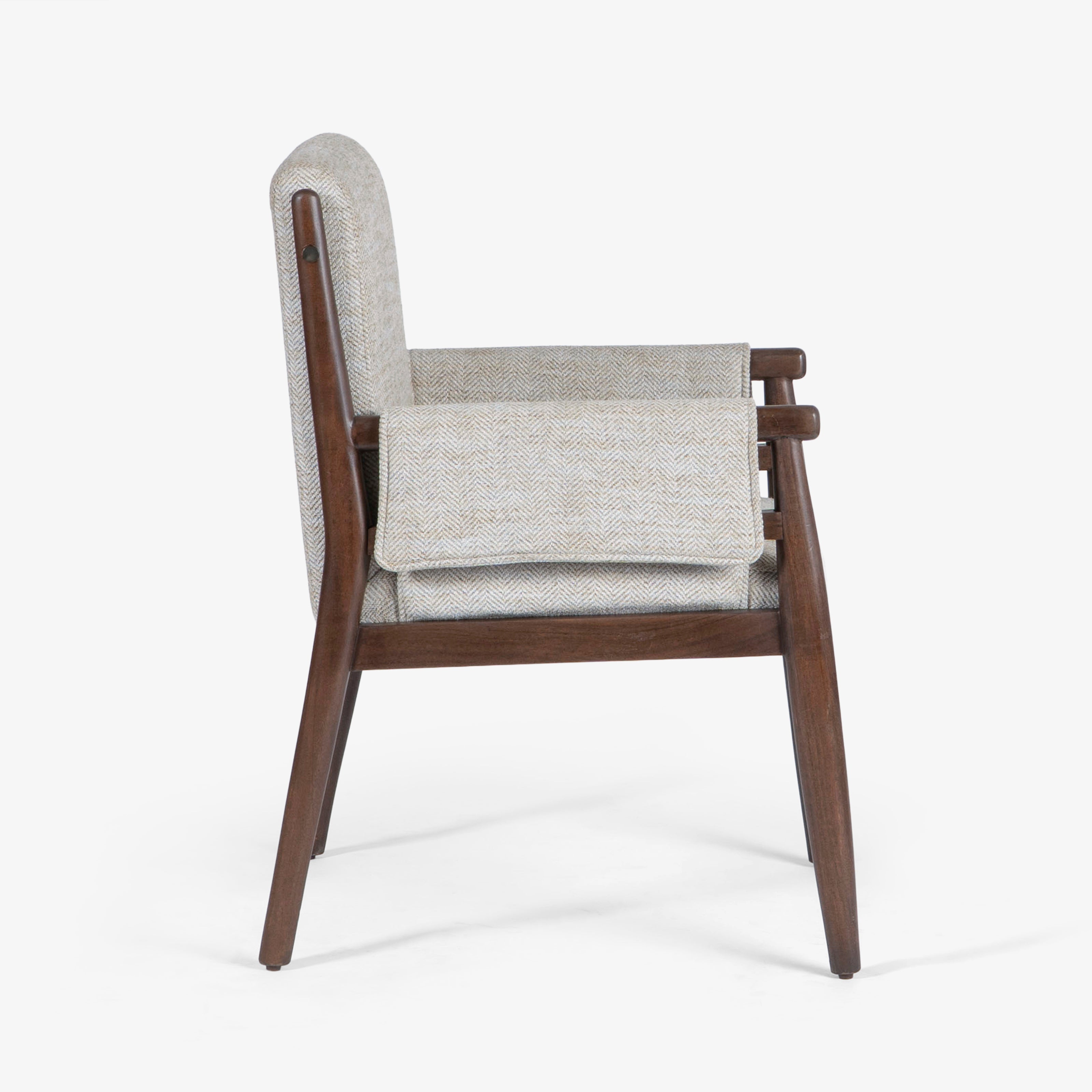 Side view of upholstered armchair