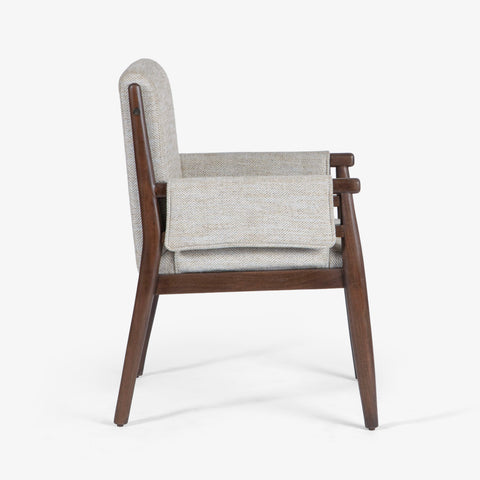 Side view of upholstered armchair