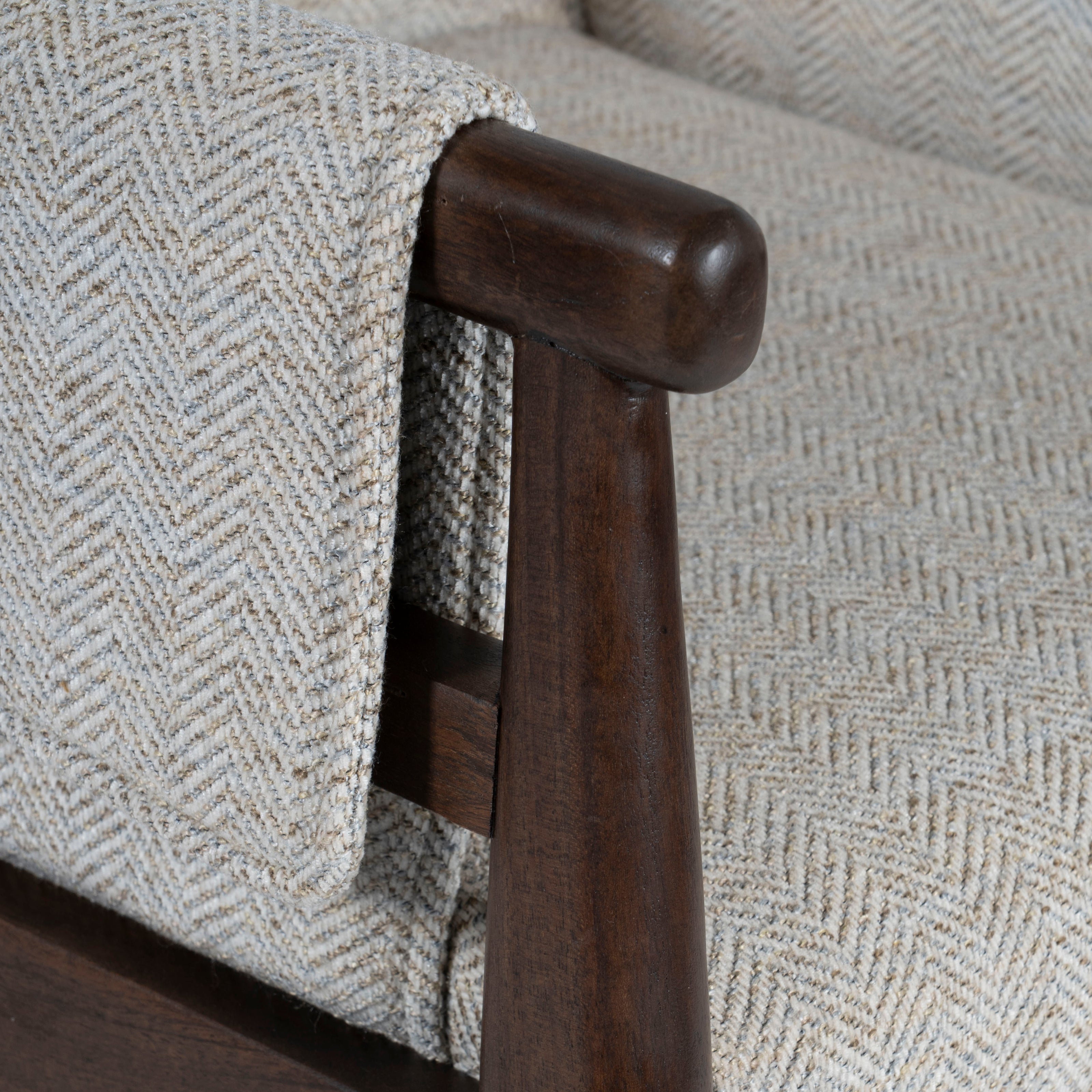 Close-up of wood arm detail