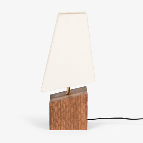 Table lamp with wooden base and tapered fabric shade, side view
