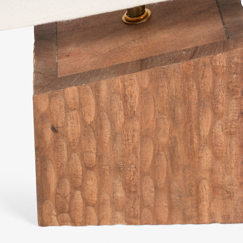 Handcrafted wooden base detail of modern table lamp