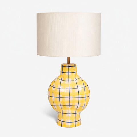 Studio shot of the yellow plaid ceramic lamp facing forward.