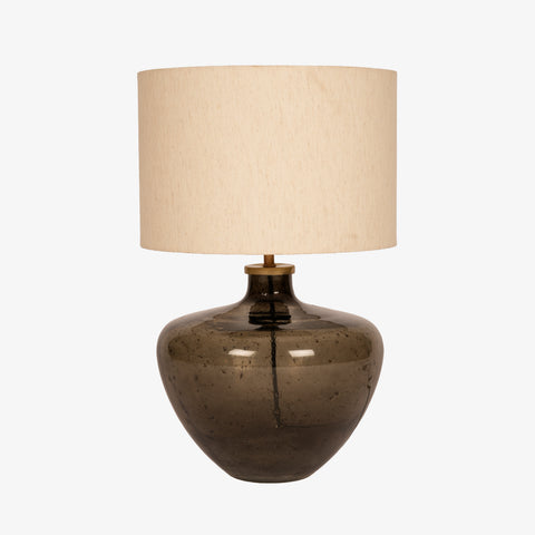 Studio shot of the smoky glass table lamp on a white background.