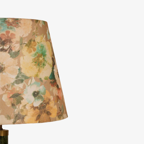 Close-up detail of the colorful floral patterned fabric lampshade.