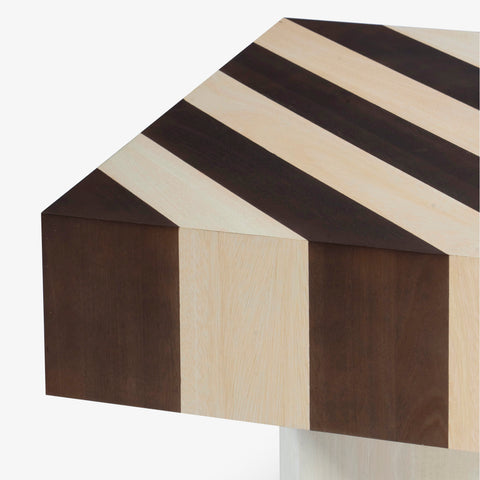 Corner detail of striped wood tabletop