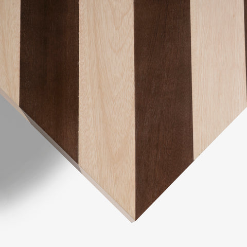 Edge detail of striped wood table