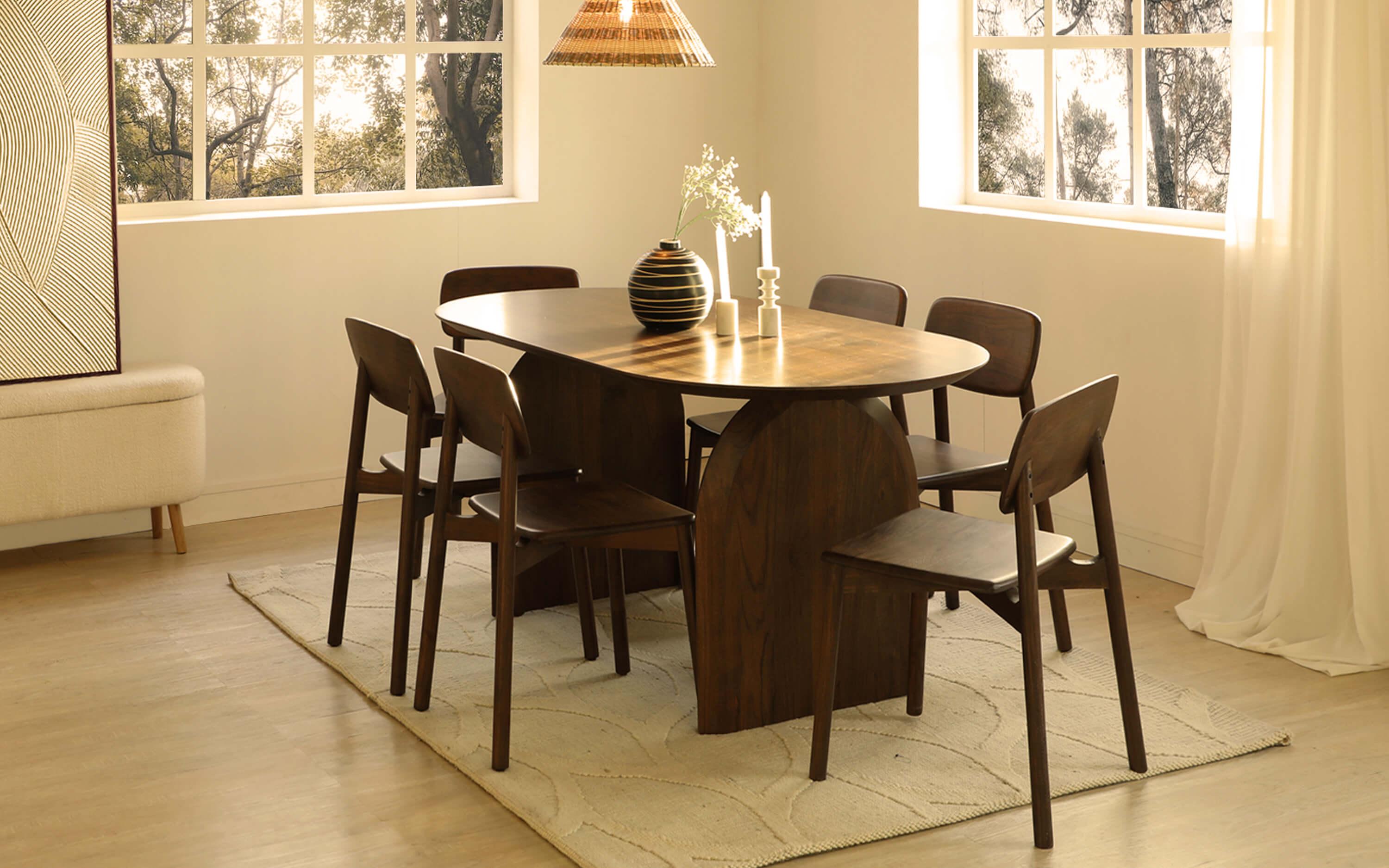 Emiko 6 Seater Oval Dining Table in Solid Wood - Close shot - from right angle - Orange Tree