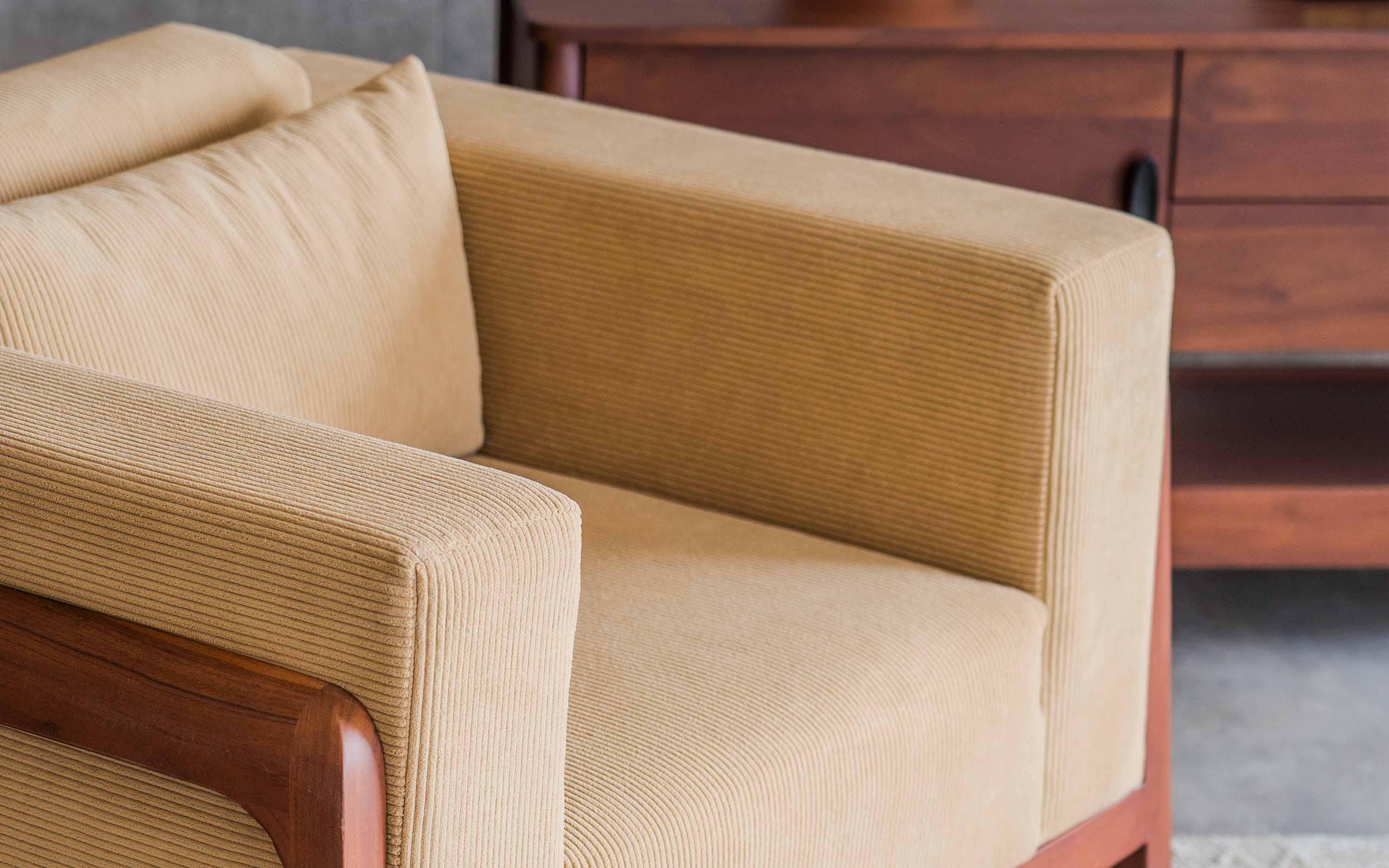 Joy 1 Seater Yellow Sofa with Wooden Legs - Close shot - from right angle - Orange Tree