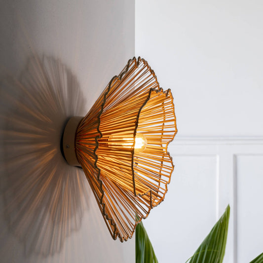 Klimt Cane Wall Lamp with natural cane shade on an abstract mild steel frame. Impressionism-inspired design for a unique decorative wall light