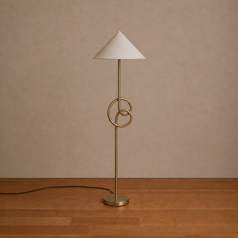 Modern geometric floor lamp illuminated with warm light