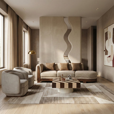 Curved sofa with layered rug and table