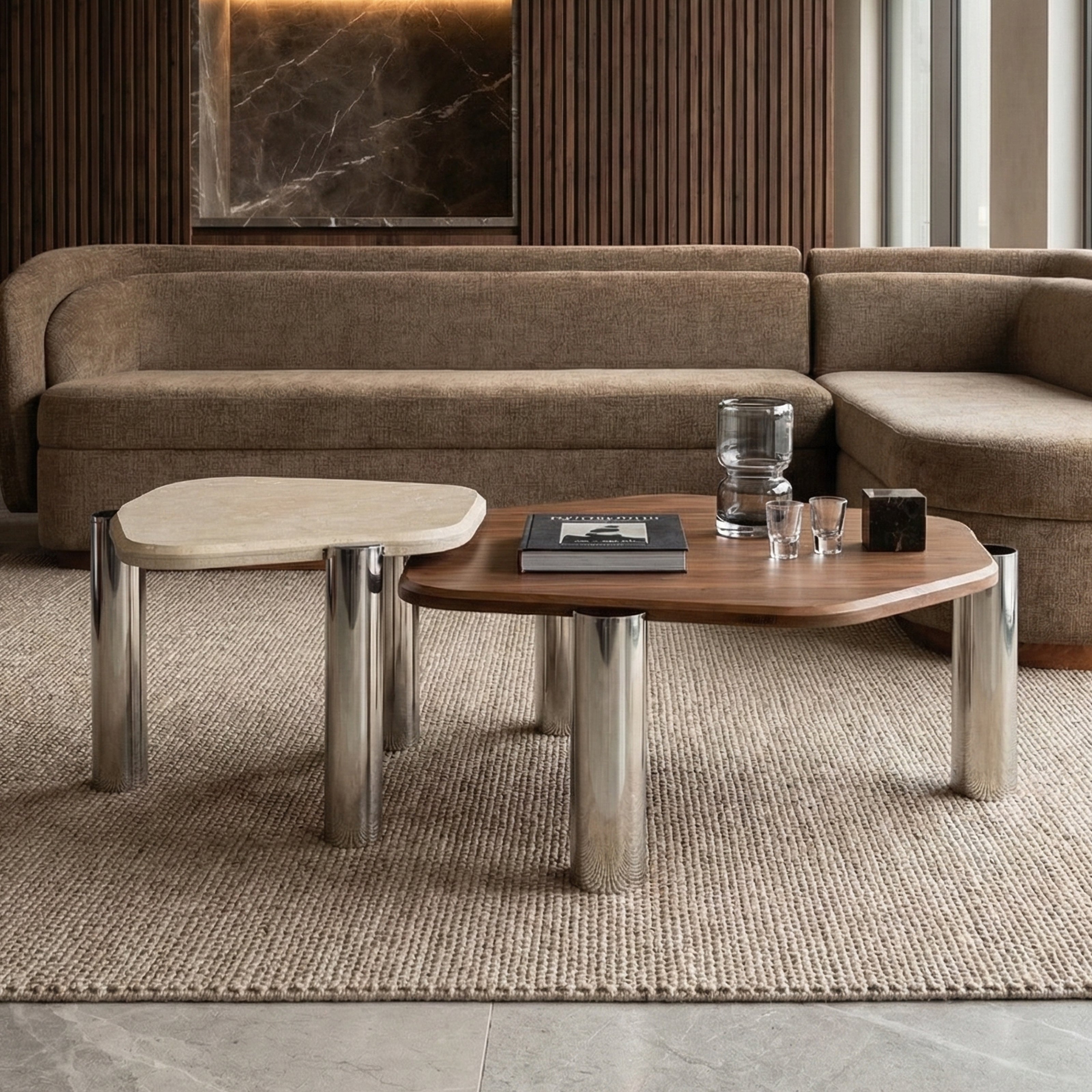 Stylish nesting center tables placed in front of a sofa.