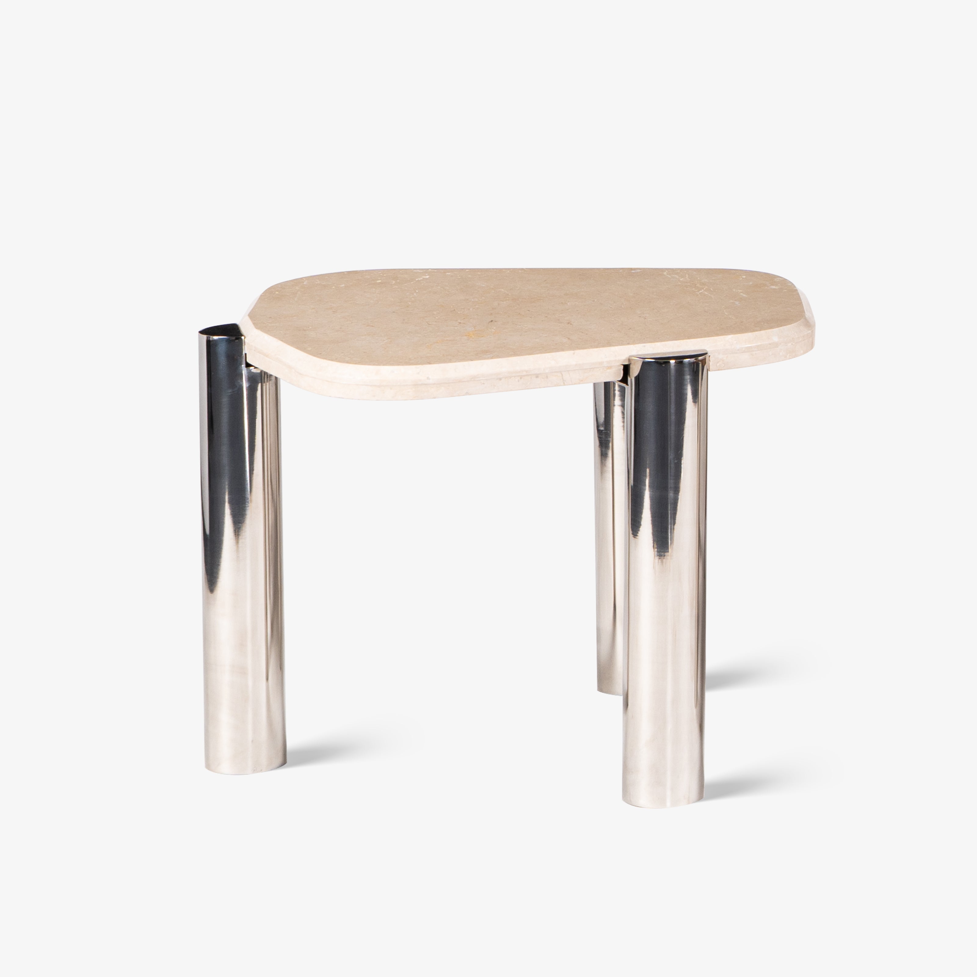 Small round side table with light top and chrome legs.