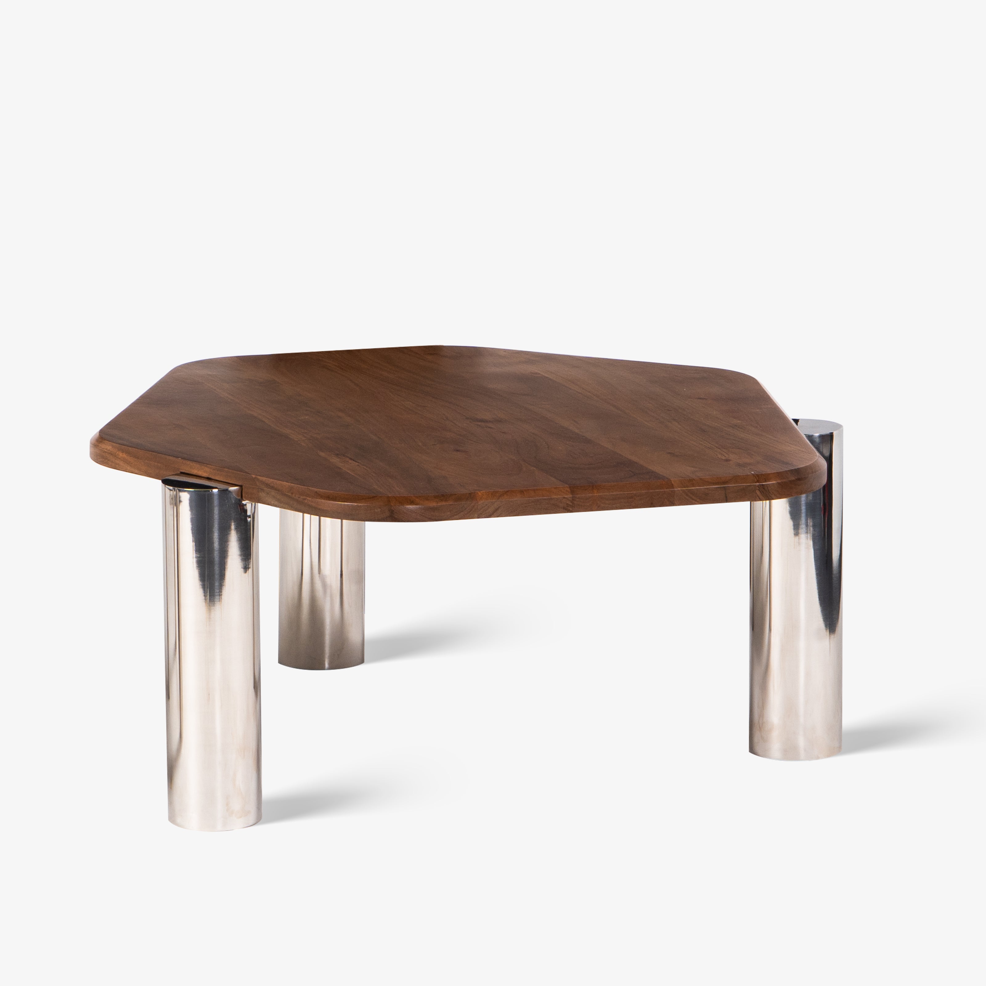 Modern coffee table with wooden surface and chrome legs.