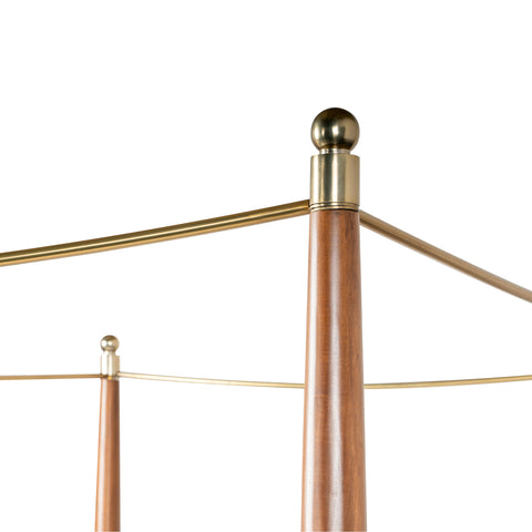 Close-up of metal canopy frame connection on a four poster bed.