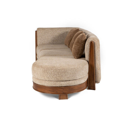 side view of curved beige sofa