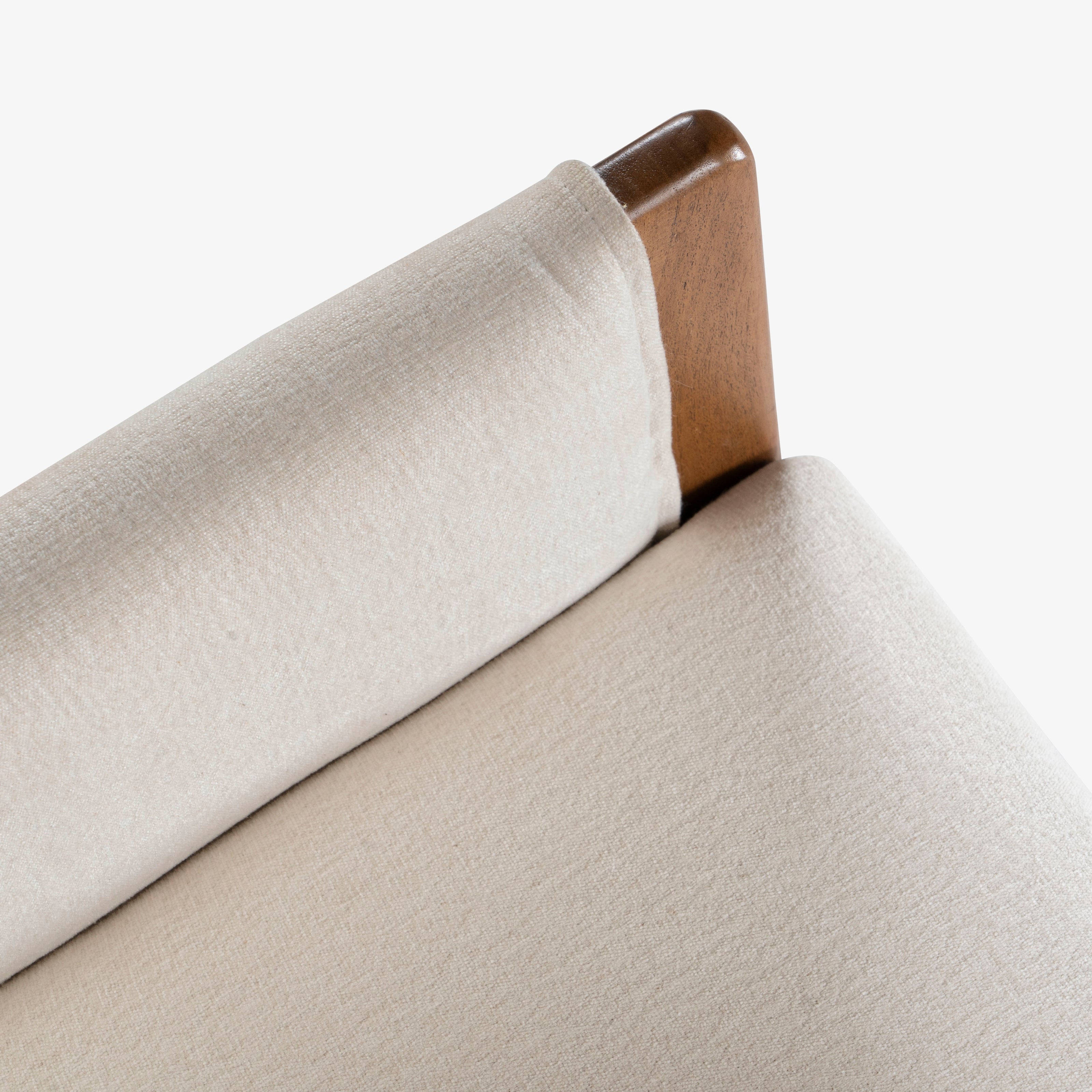 Fabric and wood arm detail