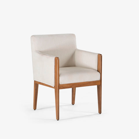 Angled view of upholstered armchair