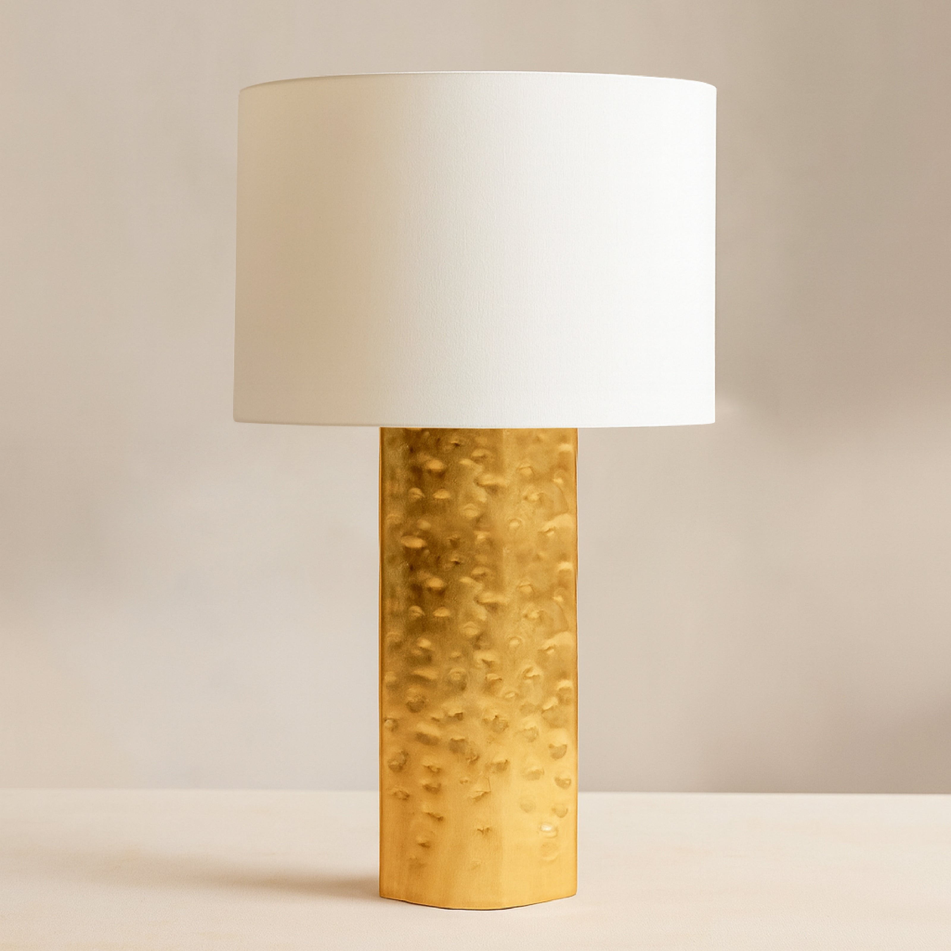 A modern gold study table lamp with dual frosted globes styled on a dark wood side table lamp set
