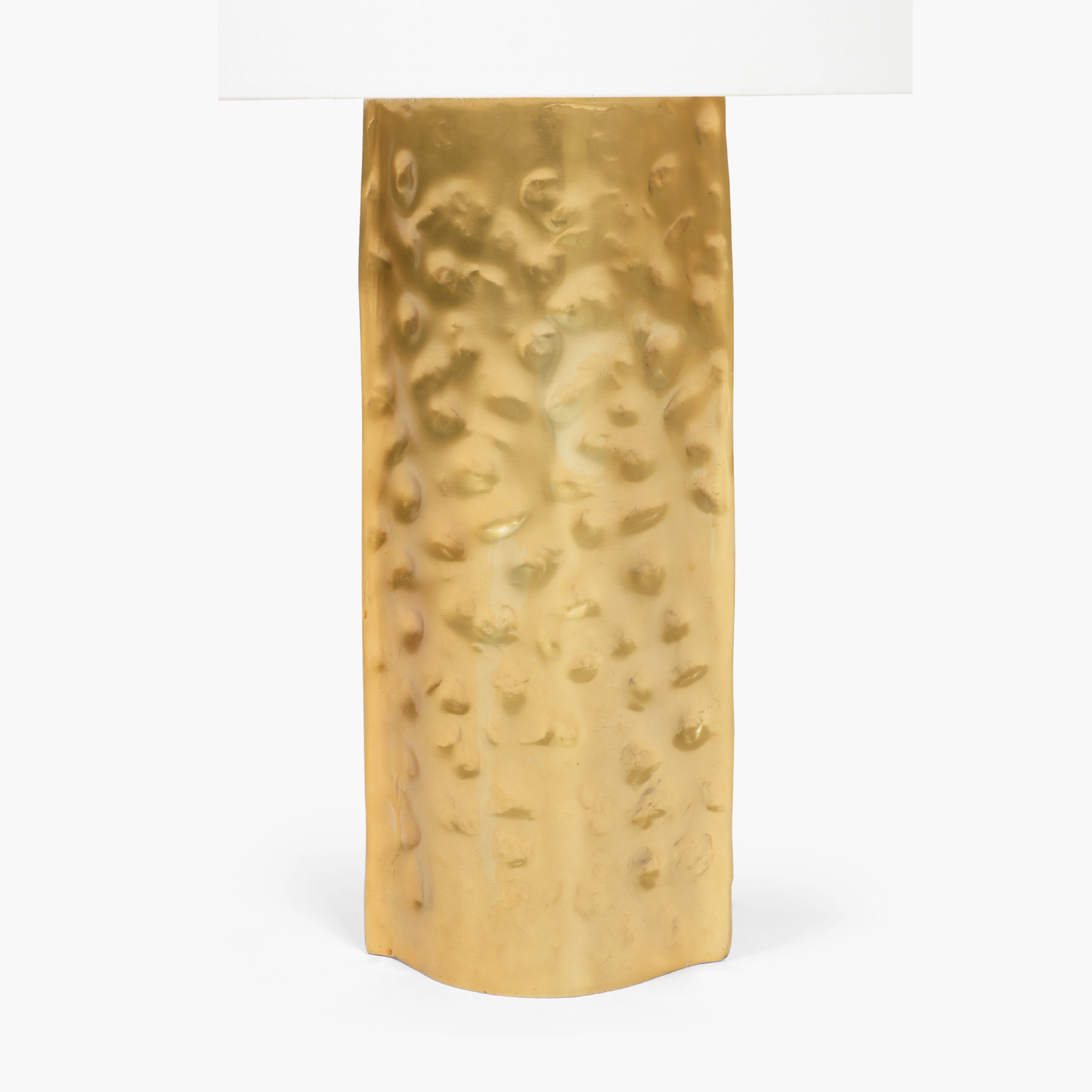 Polished gold circular base plate for stable use as bedroom side table lamps.