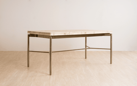 Nouve Wooden Dining Table 6 Seater with curved edges and vintage design, crafted from Burl Veneer and Stainless Steel, with a light-brushed satin brass finish on legs.