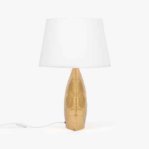 Gold table lamp with sculpted metal base and white fabric shade, modern bedroom table lamp.