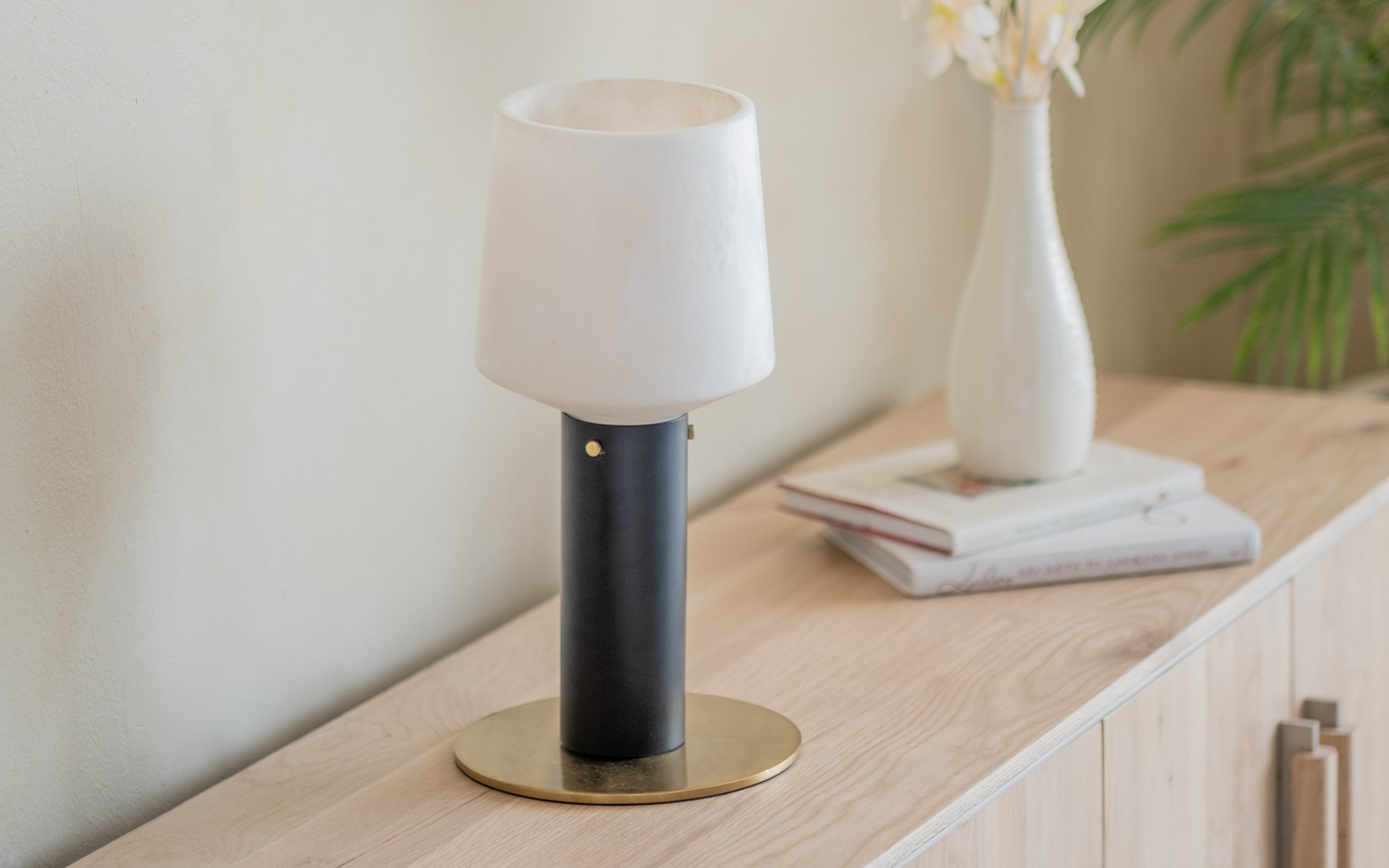 Orira Cylindrical Table Lamp | White Shade & Black Metal base - Close shot - Orange Tree